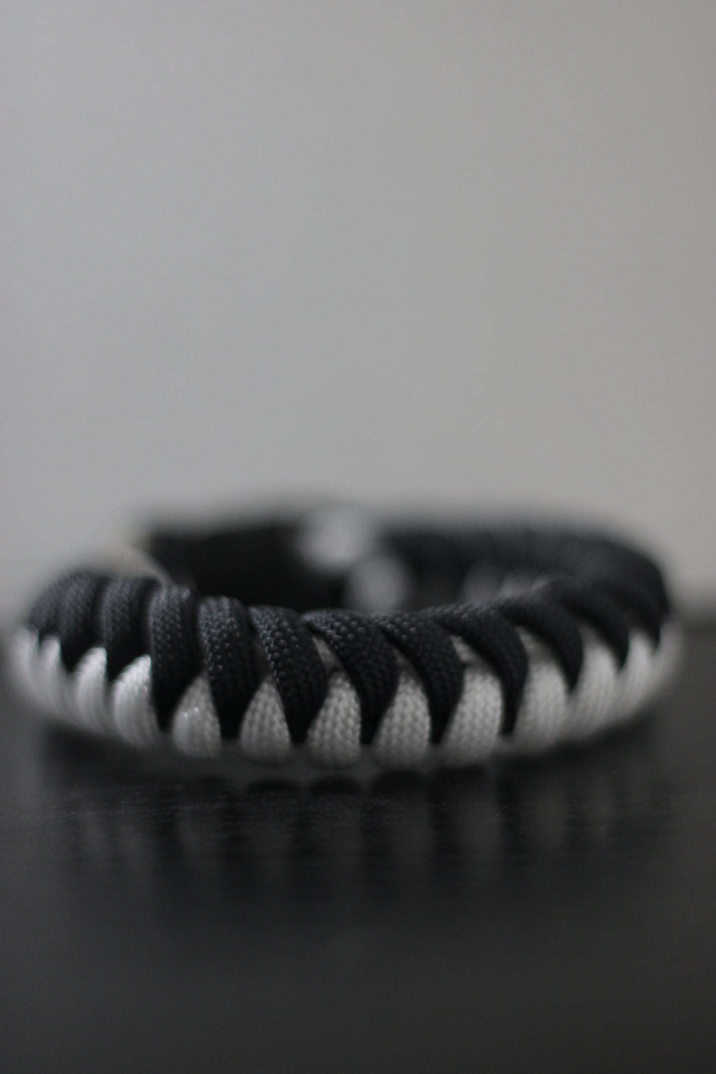 White and black half-braided bracelet