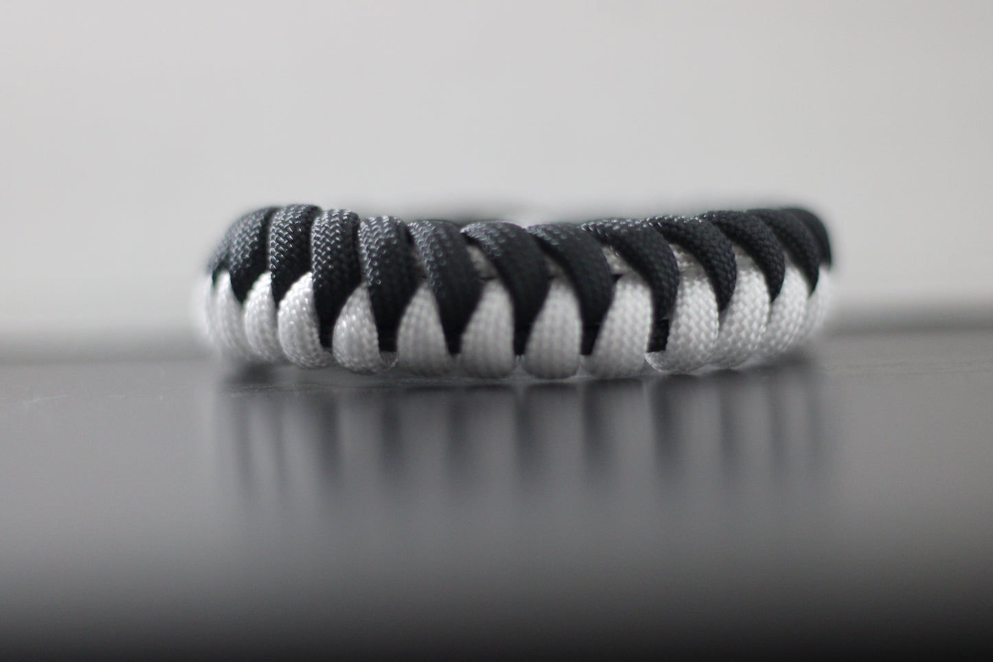White and black half-braided bracelet