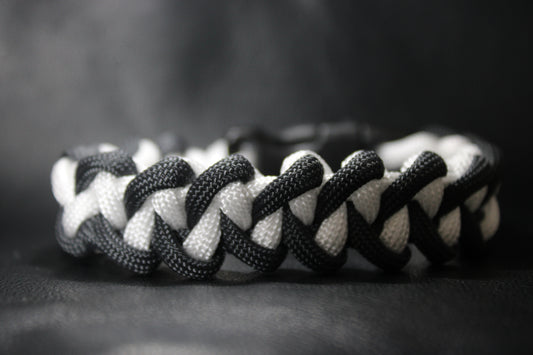 Anthracite and white braided cross bracelet